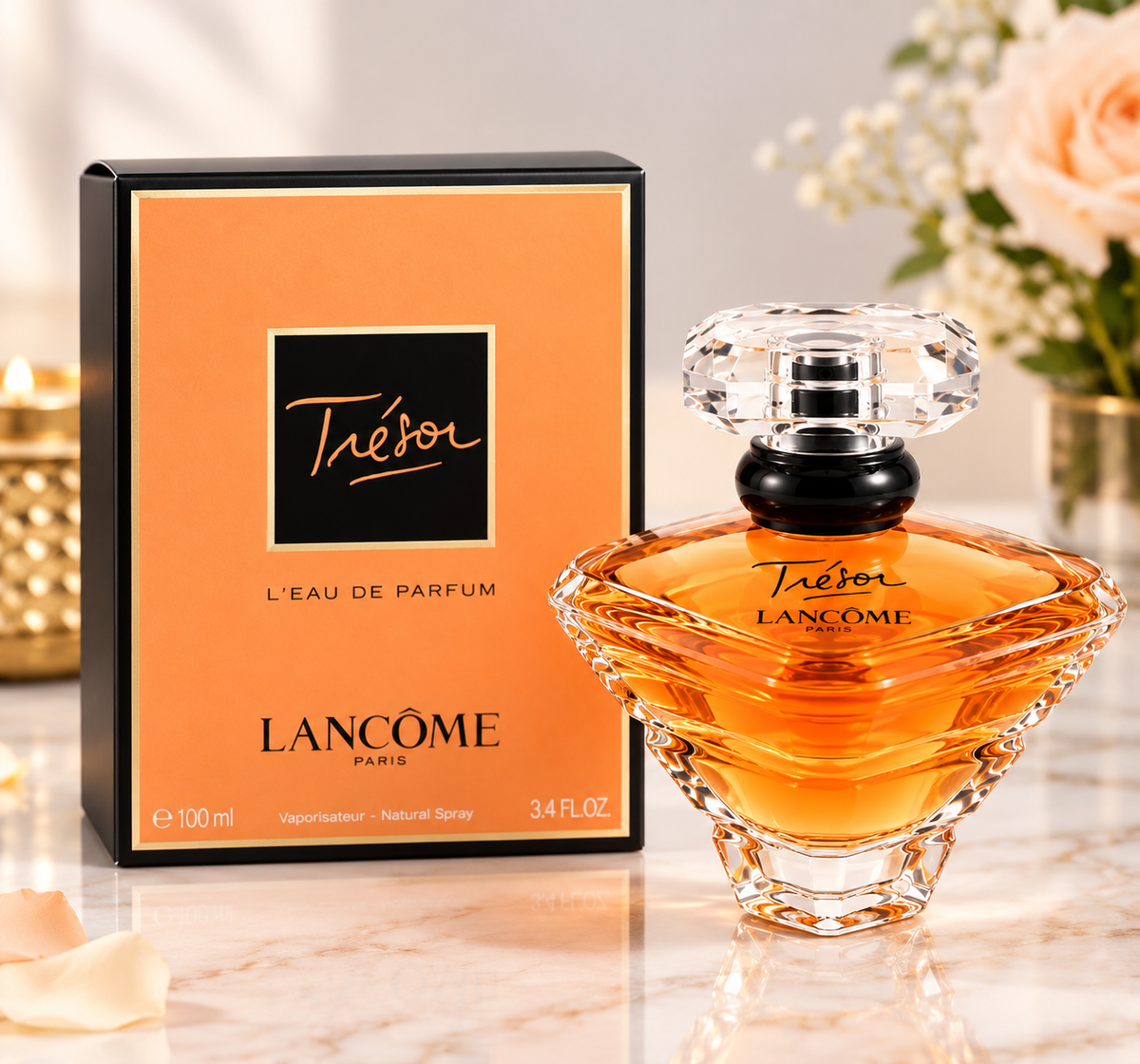 Lancôme Trésor Eau de Parfum for Women, 100 ml (3.4 fl oz), featuring an amber-colored perfume bottle and matching orange box.