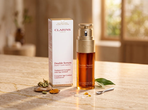 Clarins Double Serum Hydric and Lipidic System facial serum 50 ml gold pump bottle and product box.