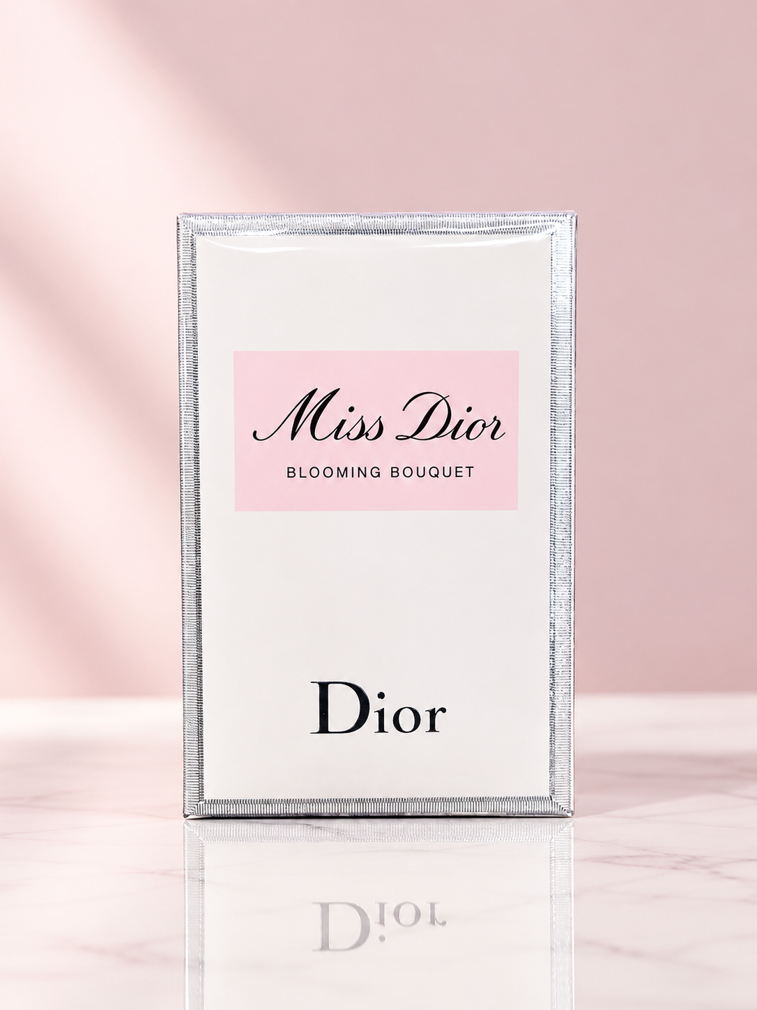 Miss Dior Blooming Bouquet women's floral fragrance in elegant white and pink packaging.