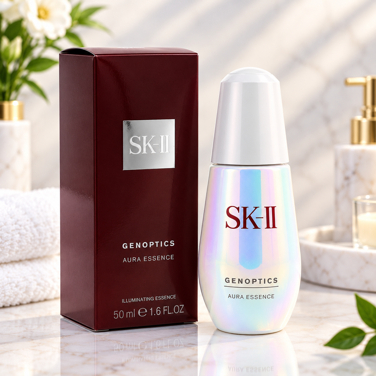 SK-II GenOptics Aura Essence illuminating facial serum in an iridescent bottle with a dark burgundy box, 50ml / 1.6 fl oz.