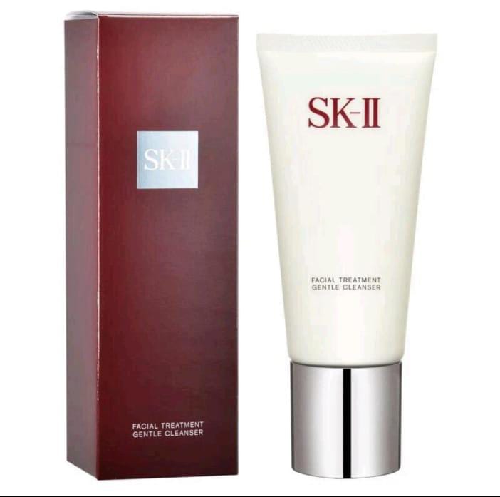 SK-II  TreFacialatment Gentle Cleanser in a white tube with a metallic cap and burgundy product box.