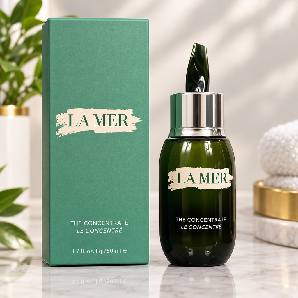 La Mer The Concentrate facial skincare treatment in a green box with a dark bottle, silver collar, and dropper, 50ml / 1.7 fl oz.